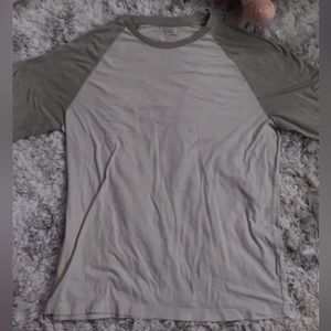 Cream and grey long sleeve shirt with a U-Shaped neckline.Size- L Brand- J. Crew